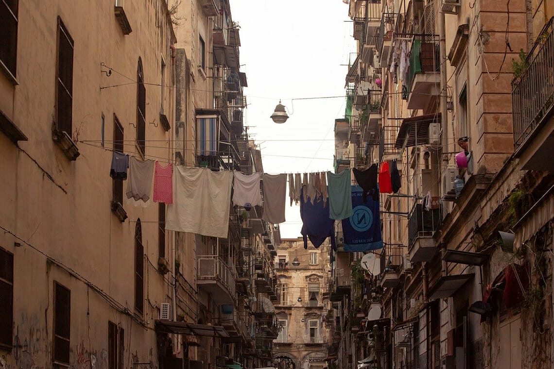 clothes hanging between two buildings