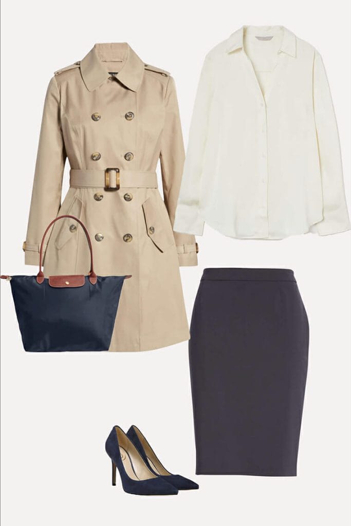 trench coat, navy skirt and heels and an ivory shirt